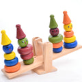 Montessori teaching AIDS children wooden rainbow tower balance toys, children clown balance blocks wood toys